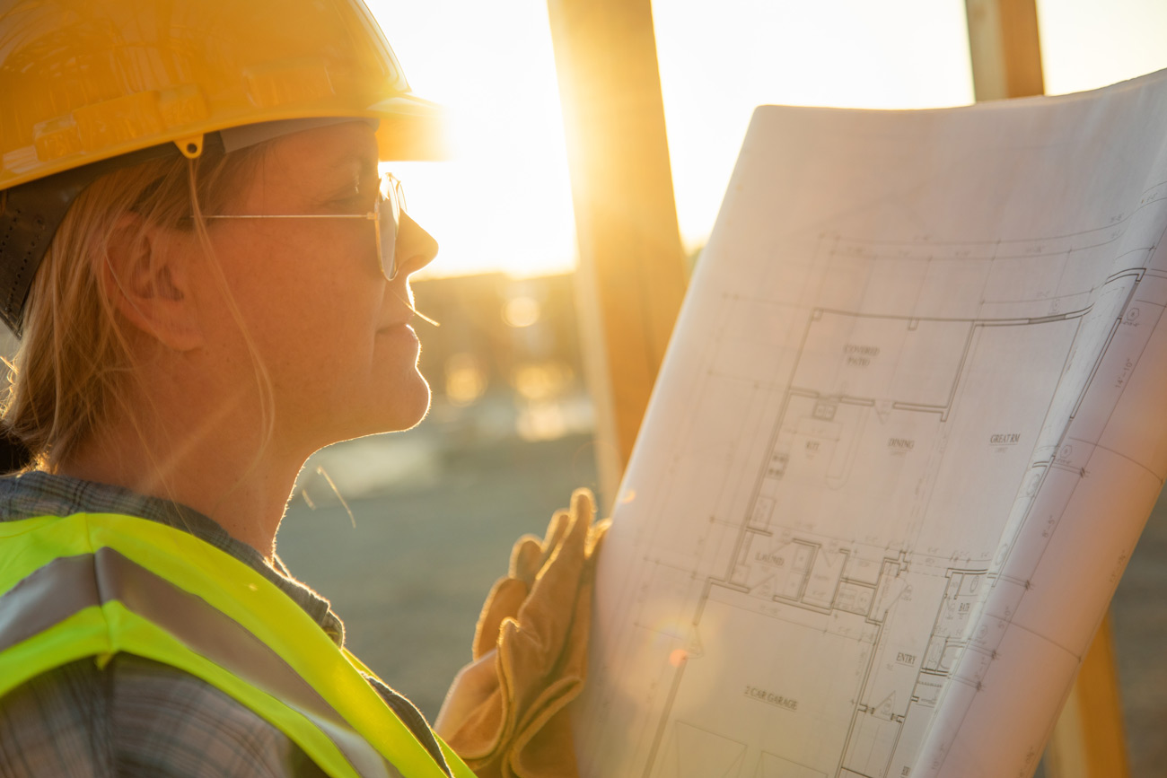 Bonded contractor reviewing project plans for Tippecanoe