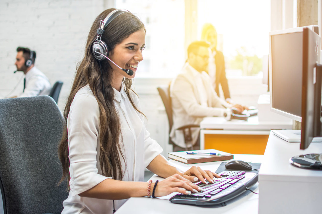 Bonded telemarketers talking with a consumer on the phone