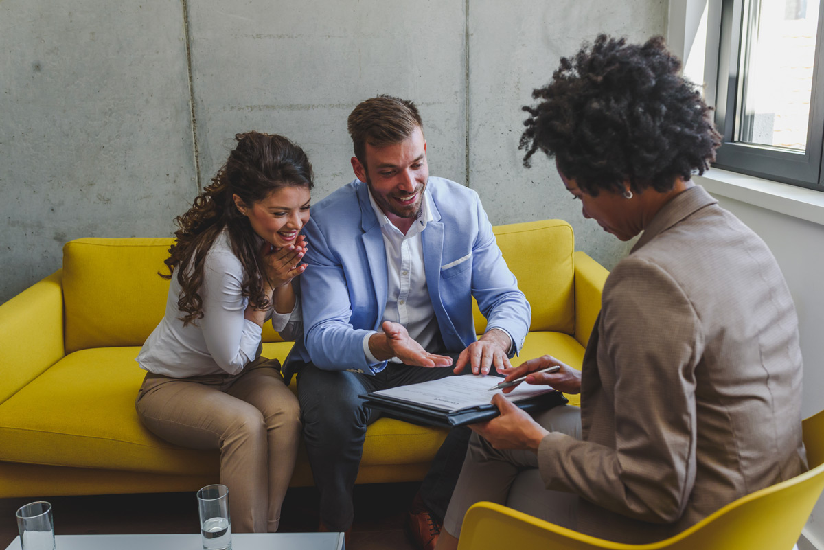 Young couple as beneficiaries of a trustee working with a bonded trustee